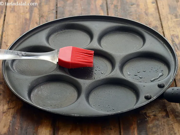 Step 19 – Now to make a <strong>healthy snack for kids</strong>,&nbsp; heat a mini uttapa pan and grease …