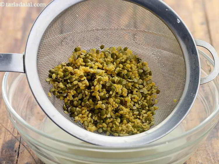 Step 9 – Strain the dals using a strainer.