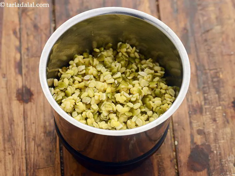 Step 12 – After 1 hour, again strain the dals of<strong> mixed dal pancake for kids</strong>. Add this …