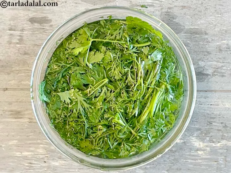 Step 13 – Since we are making a chutney, you can use the stems of the coriander. Put …