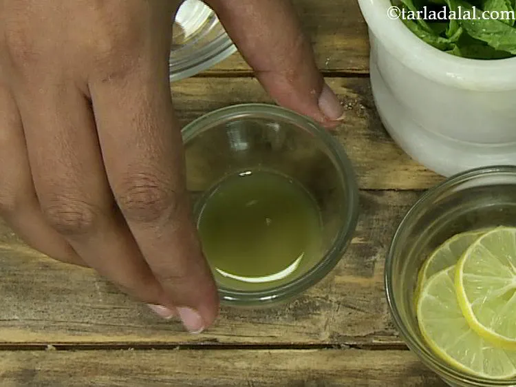 Step 6 – Place the grated ginger in a strainer and press it with a spoon to extract …