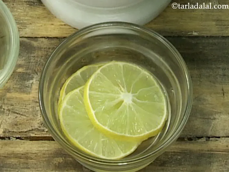 Step 7 – Take a lemon, wash it and cut it into slices. This will lend a fresh …
