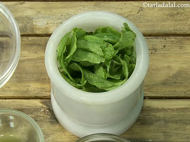 Step 8 – Take mortar and pestle (khalbhatta) and place the refreshing mint leaves in it. Prefer a …