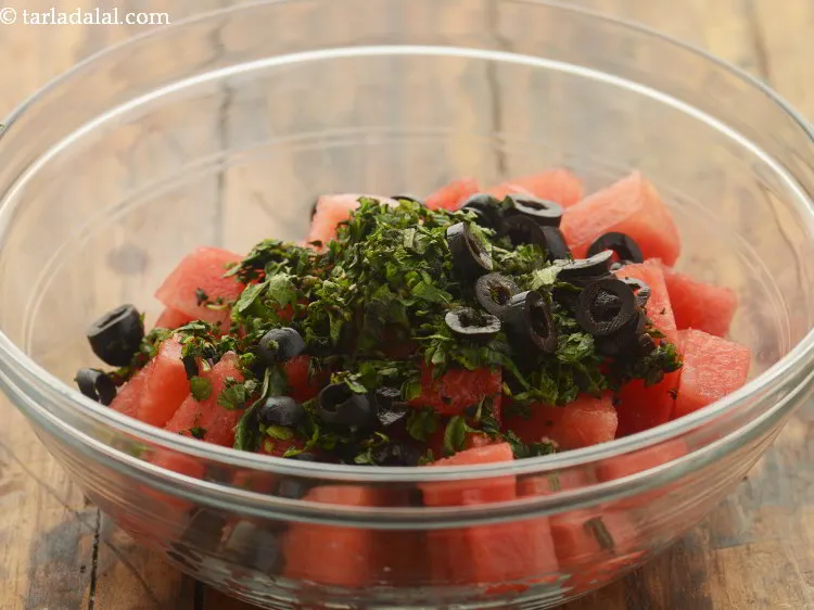 Step 19 – Add the black olives as well.&nbsp;