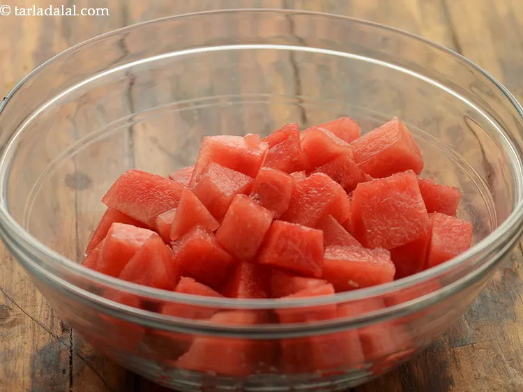 Step 17 – Then for <strong>watermelon mint salad with lime honey dressing</strong>, take watermelon cubes in a bowl. …