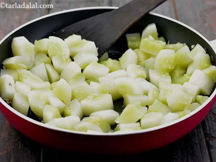 Step 10 – Once the cucumbers turn soft, get the pan off the flame and keep aside until …
