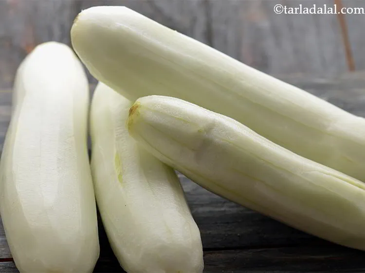 Step 3 – Peel the cucumbers.&nbsp;