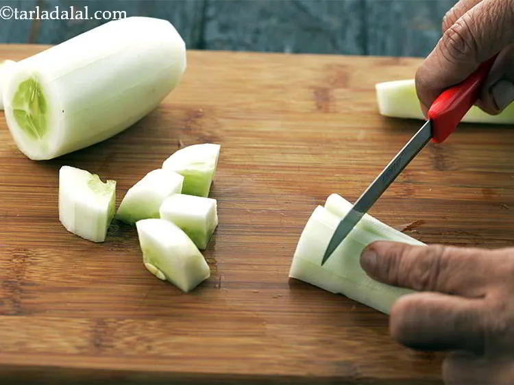 Step 4 – Further, chop the cucumbers for <strong>Minty Cucumber Cooler</strong> and keep aside.
