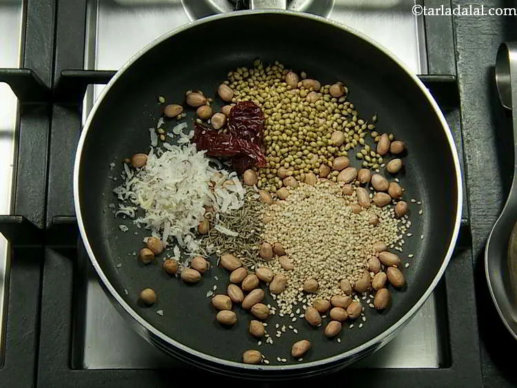 Step 11 – Add the grated dry coconut.
