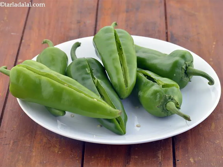 Step 19 – Similarly slit and remove seeds from all the chillies.
