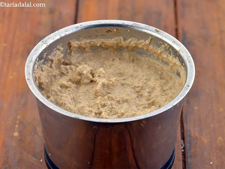 Step 17 – Now add &frac34; cup of water and blend to a smooth paste. Keep aside.