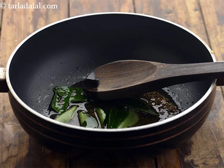 Step 16 – Add curry leaves and saut&eacute; on a medium flame for 30 seconds.