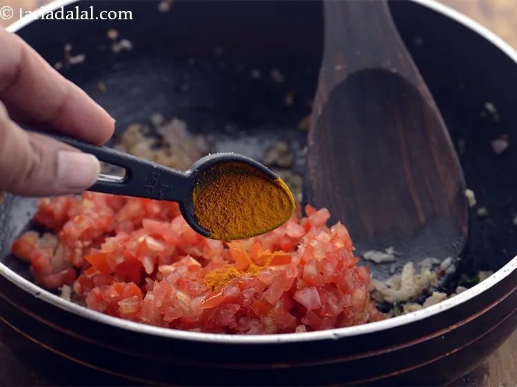 Step 21 – Add turmeric powder.