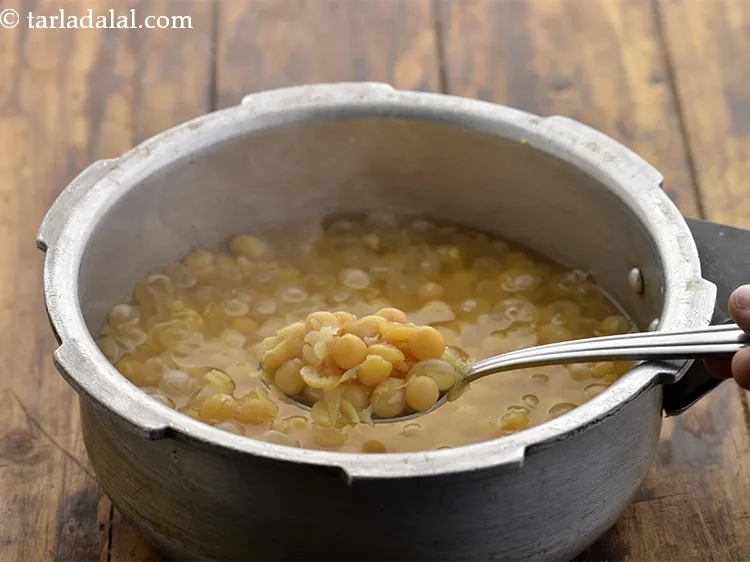 Step 10 – This is how it looks after cooking. Keep the safed vatana and the water aside. …