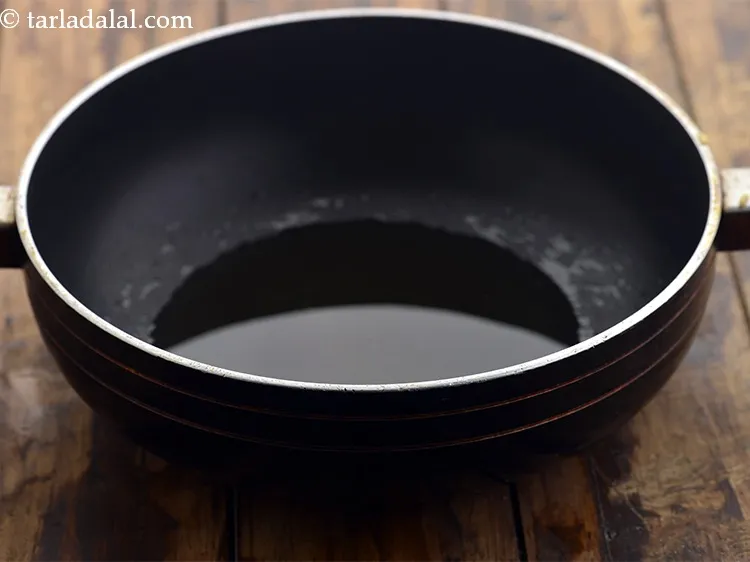 Step 12 – Start making the <strong>misal</strong> by heating the oil in a deep non-stick pan. To make …