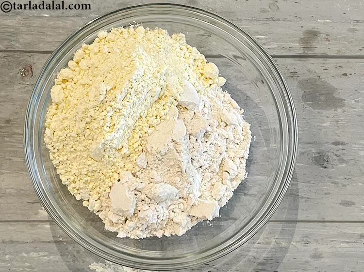 Step 3 – <meta charset="UTF-8" />Add 1/2 cup&nbsp;<a href="https://www.tarladalal.com/glossary-besan-chana-dal-flour-bengal-gram-flour-952i">besan (bengal gram flour)</a>&nbsp;to it.&nbsp;