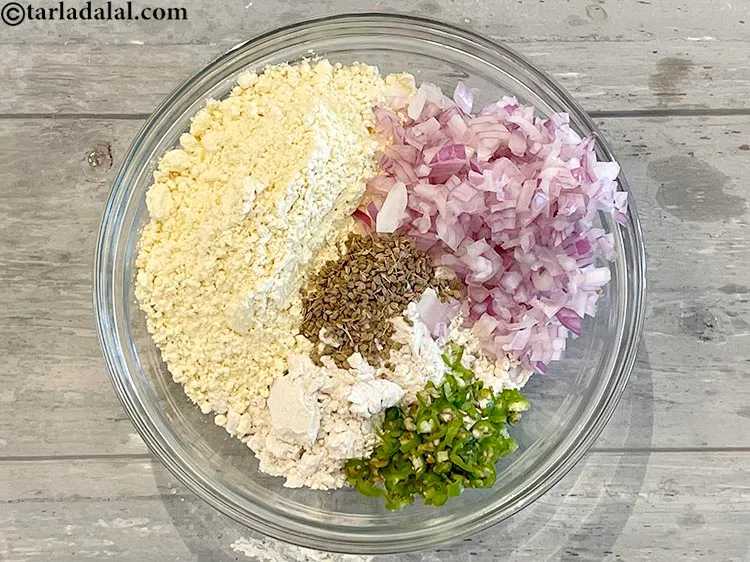 Step 6 – Add&nbsp;1 tsp&nbsp;<a href="https://www.tarladalal.com/glossary-carom-seeds-ajwain-thymol-seeds-bishops-weed-266i">carom seeds (ajwain)</a>.