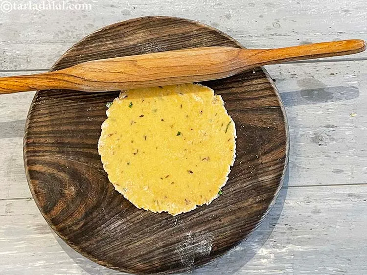 Step 15 – Roll out each portion into a 100 mm. (4") diameter circle using a little whole …