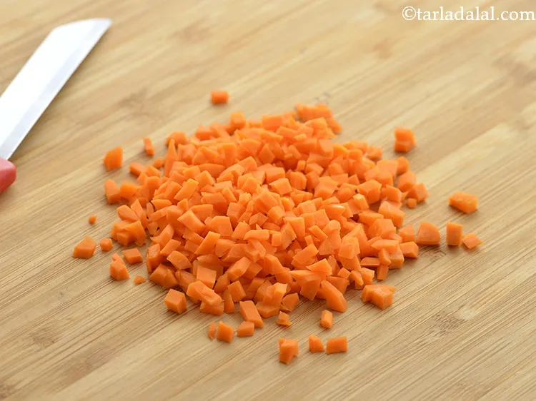 Step 13 – Using a sterilized knife finely chop the carrots. Keep the chopped carrot aside.&nbsp;&nbsp;