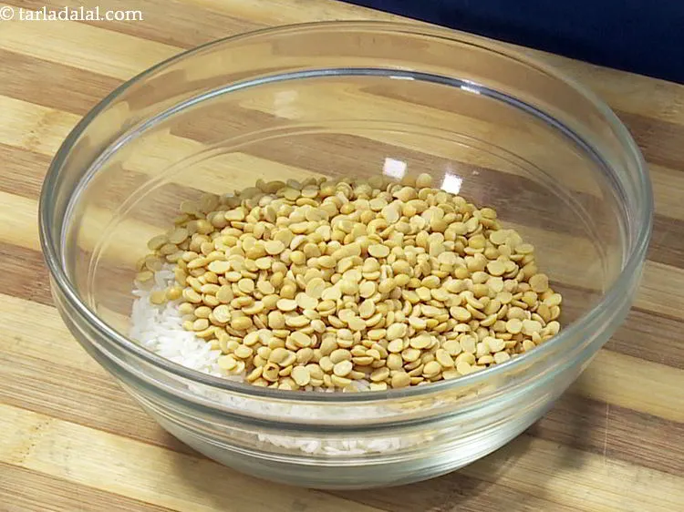Step 2 – In a bowl, take rice and toovar dal.