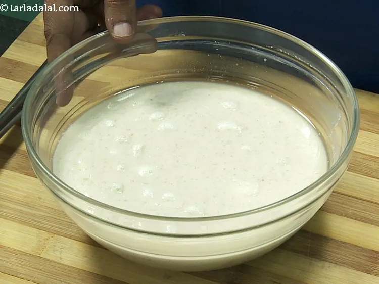 Step 12 – After fermentation, the <strong>mixed dal handvo</strong> batter will look like this.