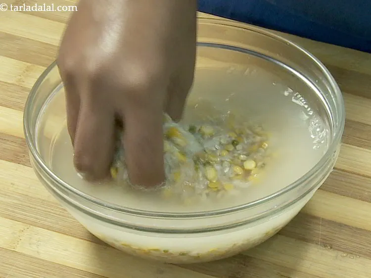 Step 4 – Wash the dals, rice and whole wheat together using enough water.