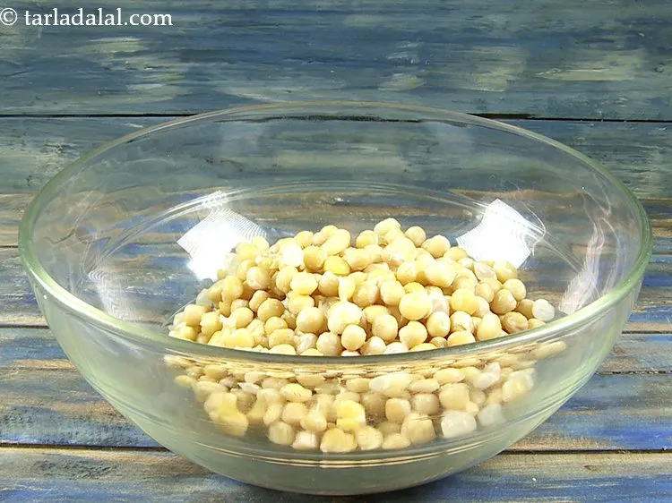 Step 27 – Add soaked and boiled safed vatana.