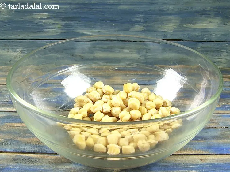 Step 26 – To prepare mixed <strong>sprouts and green pea chaat</strong>, in a deep bowl take soaked and …