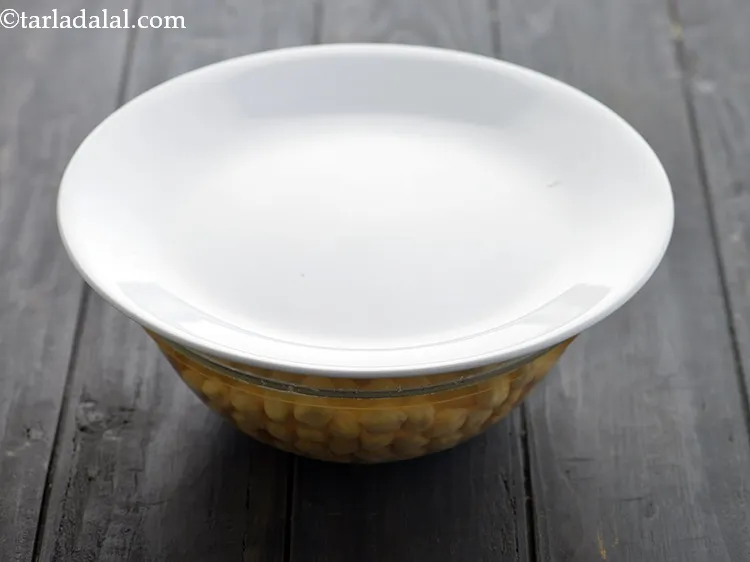 Step 1 – Before we begin making the <strong>mixed sprouts and matar chaat</strong>, wash and soak ___ cup …