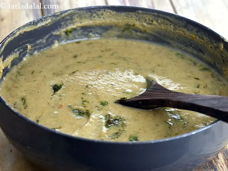 Step 14 – Switch off the flame and add the mint leaves.