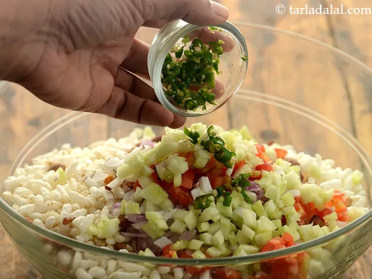 Step 15 – Add finely chopped green chillies. You can add more or less as per the spice …