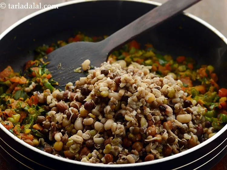 Step 24 – Add boiled mixed sprouts.&nbsp;