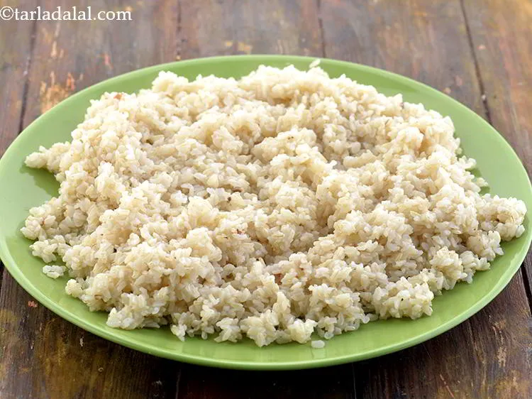 Step 8 – Transfer the Brown Rice to a plate, spread it out. Use as required.