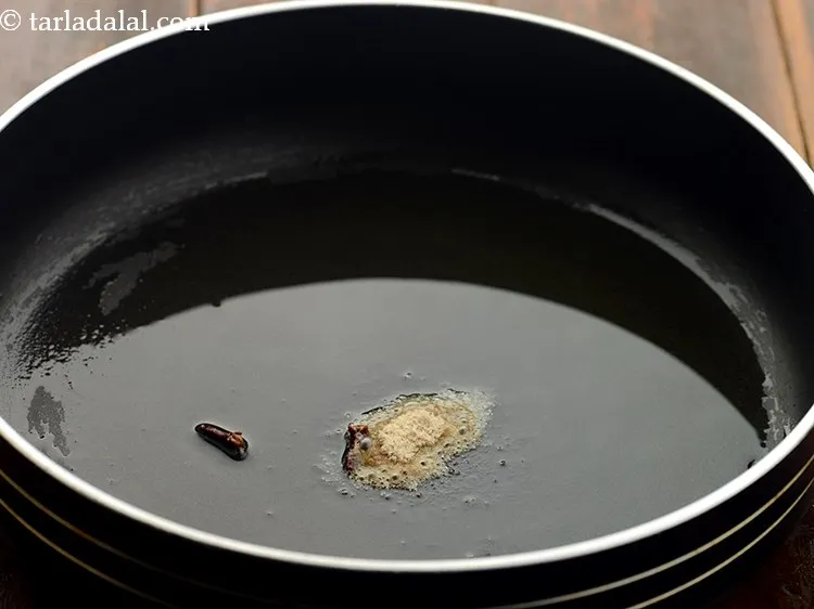 Step 11 – Add asafoetida. It aids in digestion.&nbsp;