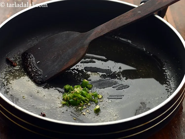 Step 13 – Add green chillies. You can adjust the quantity according to your preference of spice.