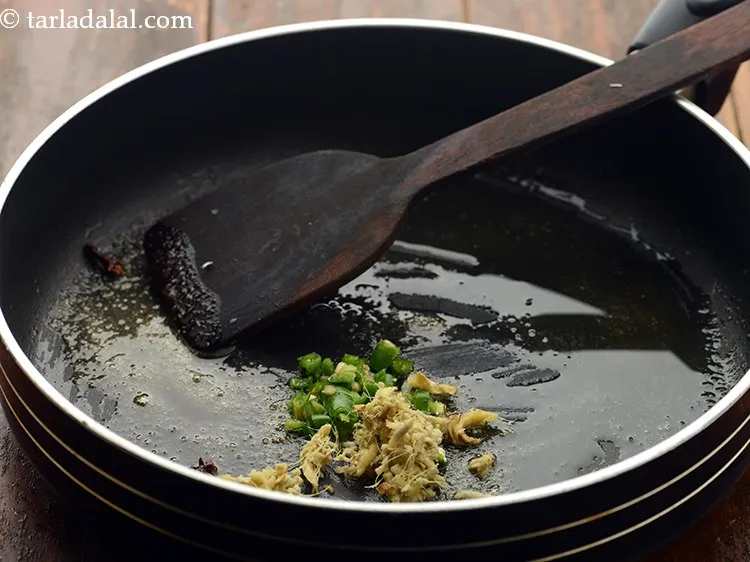 Step 14 – Add ginger. You can even add garlic if you wish to.