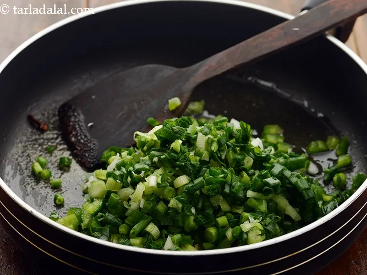 Step 16 – Add spring onion.&nbsp;