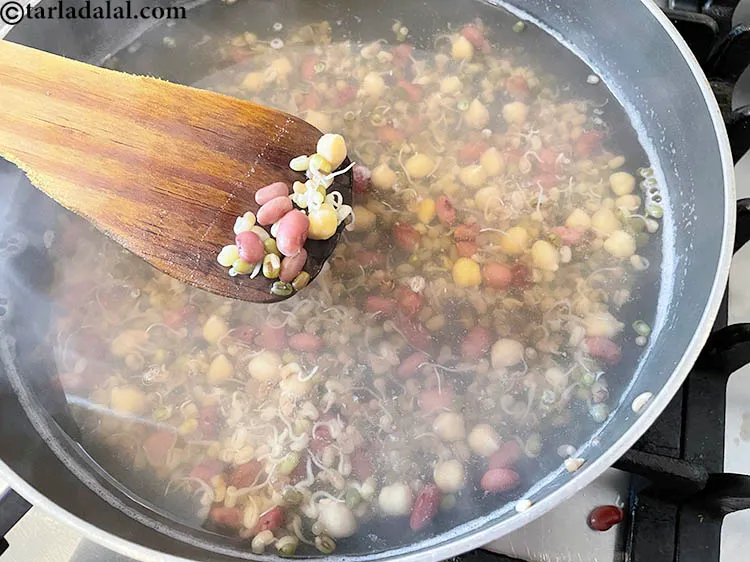 Step 7 – <strong>Check if your mixed sprouts are cooked.&nbsp;</strong>Do this by taking a laddle and removing a …