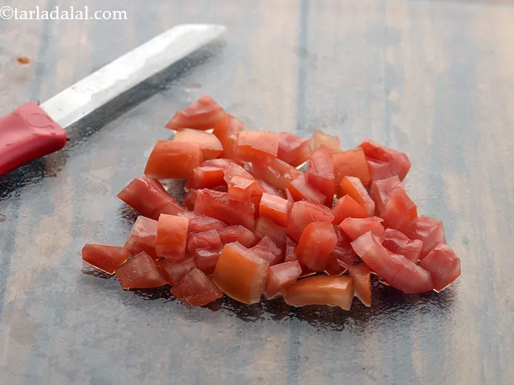 Step 32 – Using the sterilized knife chop the tomatoes into medium sized pieces and keep aside.