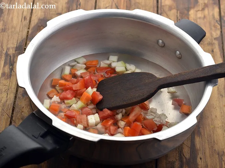 Step 38 – Mix well using a ladle.&nbsp;