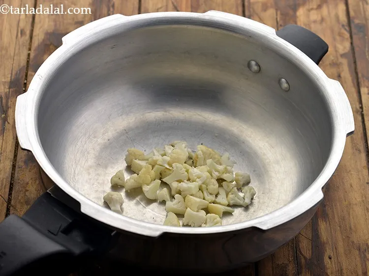 Step 33 – Now begin cooking <strong>Mixed Vegetable Soup for Babies and Toddler. </strong>Take a clean pressure cooker …