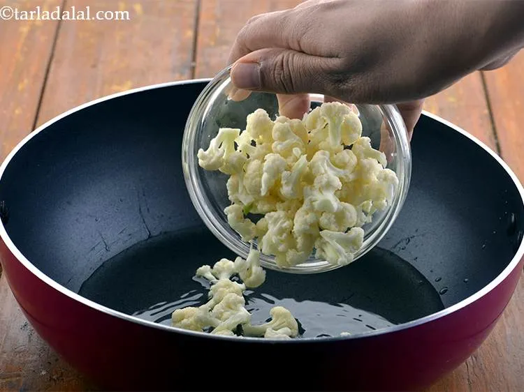 Step 13 – Now we add the vegetables. First add the cauliflower.