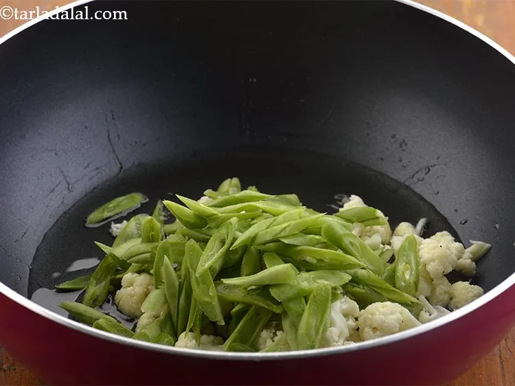 Step 14 – Then add the French beans.