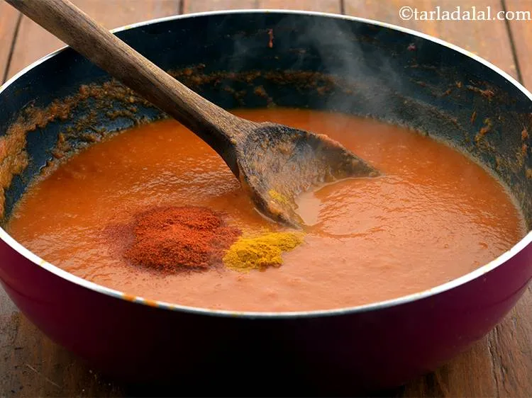 Step 26 – Add the chilli powder for spice.