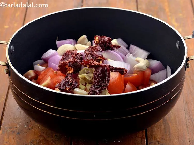 Step 7 – Add the Kashmiri red chillies as well.