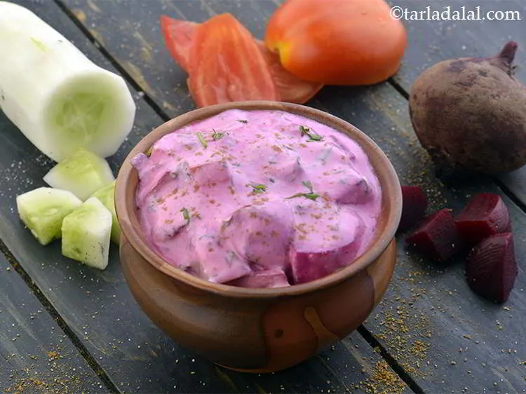 Step 13 – Refrigerate for &frac12; hour and serve the <strong>Mixed Veg Raita </strong>chilled<strong>.</strong>