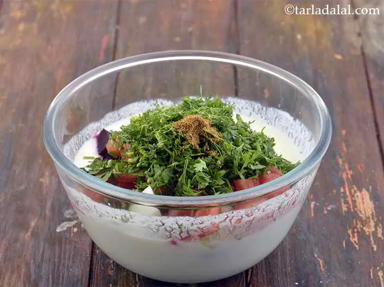 Step 10 – Also, add the roasted cumin seeds powder to flavor the curd.