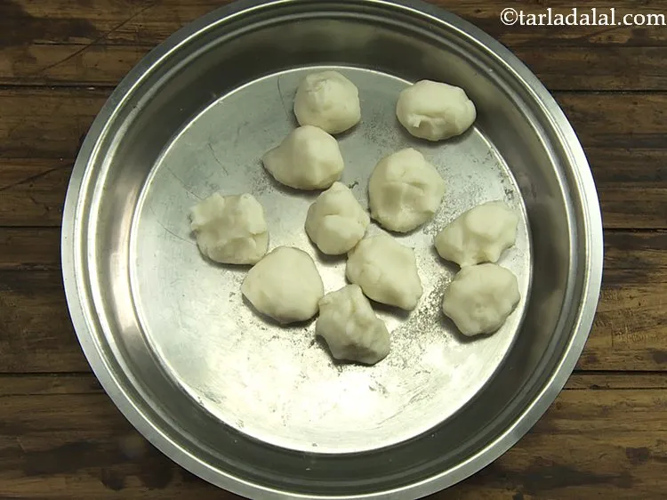 Step 8 – Divide the dough into 11 equal portions.