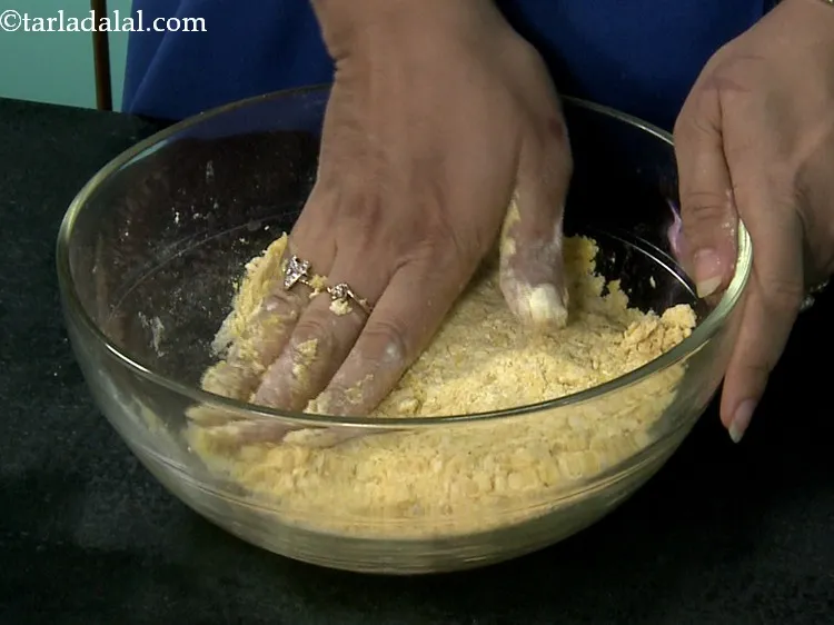 Step 9 – Gently press it to even out the mixture in a bowl.