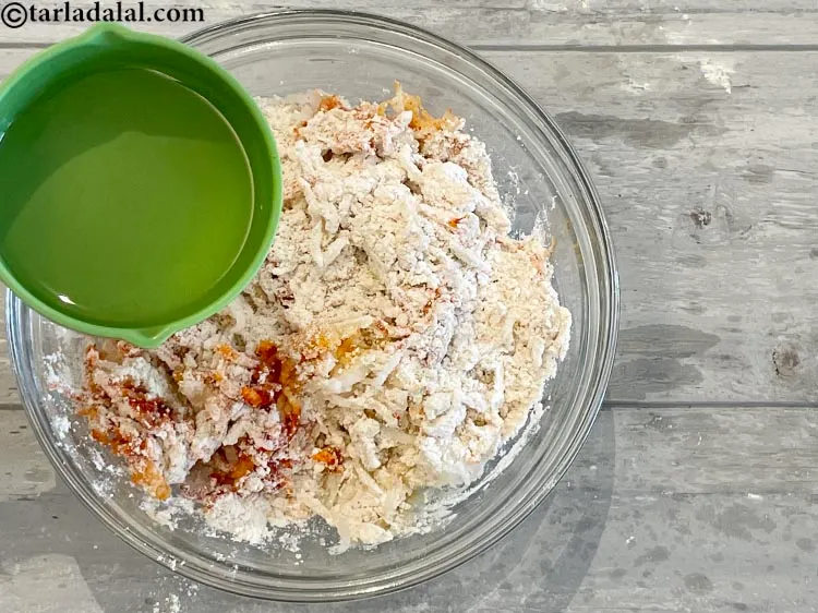 Step 9 – Add enough hot water to make a soft dough.